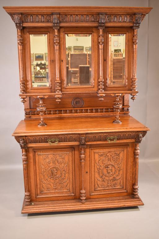 LARGE 1900'S HEAVILY CARVED OAK HUNTER'S CABINET (1 of 11)