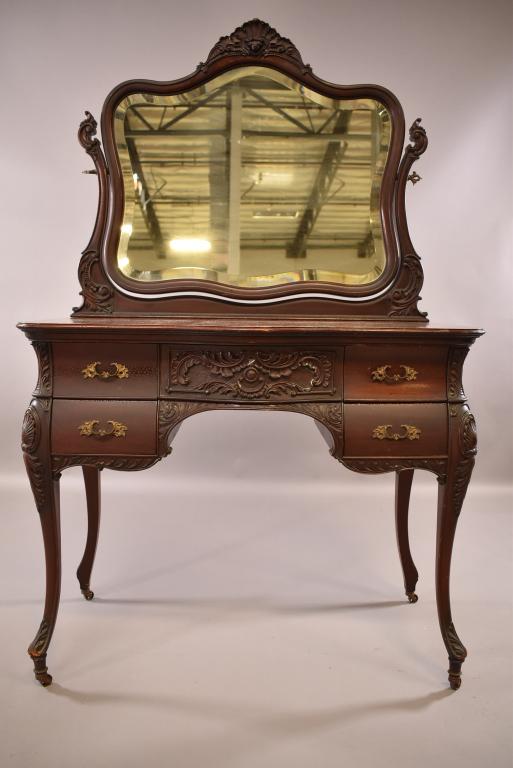 RJ HORNER MAHOGANY VANITY W/ MIRROR & CHAIR: RJ HORNER MAHOGANY VANITY WITH ADJUSTABLE TILT MIRROR. 5 DRAWER LOWER. WITH INLAID CHAIR THAT HAS BEEN REUPHOLSTERED (NOT HORNER) . MINOR FINISH WEAR TO VANITY, GOOD OVERALL CONDITION. 39" W x 22" D x