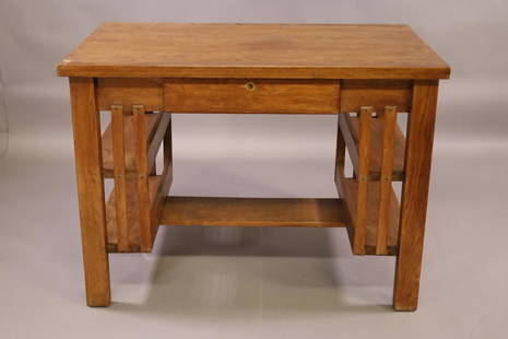 ARTS AND CRAFTS OAK LIBRARY TABLE: MISSION OAK LIBRARY TABLE. WITH BOOKCASE SIDES. NO KEY. FINISH IS WORN. 42" W x 25" D x 30" H. THIS ITEM EXCEEDS SIZE LIMITATIONS FOR IN HOUSE SHIPPING.