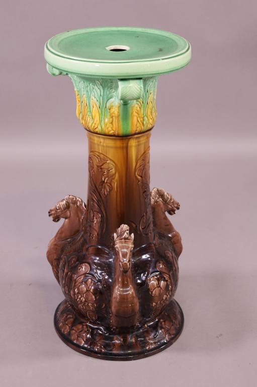 MAJOLICA STYLE POTTERY PEDESTAL: HORSE FORM MAJOLICA STYLE POTTERY PEDESTAL. UNMARKED IN GOOD CONDITION. NO POT. 11" DIAMETER X 25" TALL