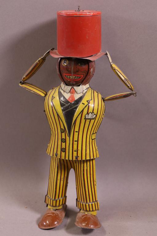 GERMAN BLACK AMERICANA TIN WIND UP TOY (1 of 3)