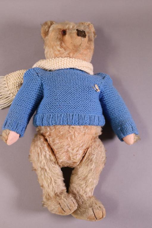 STEIFF TEDDY BEAR: WITH METAL TAG, JOINTED LIMBS. 18" H. STAINED, FUR IS WORN.