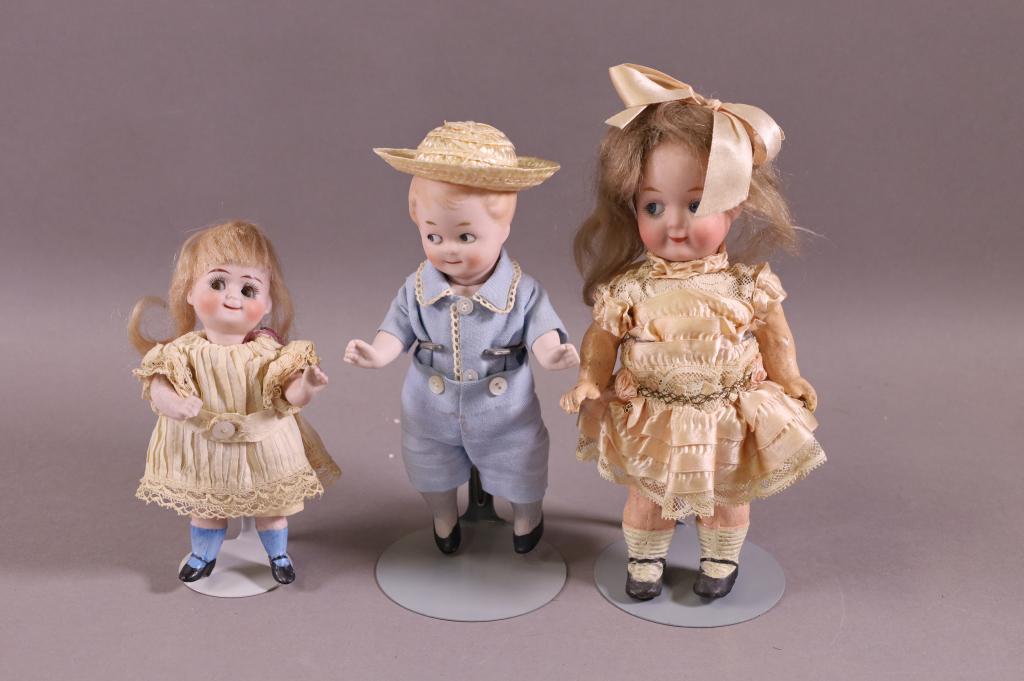 3 SMALL PORCELAIN DOLLS (1 of 2)