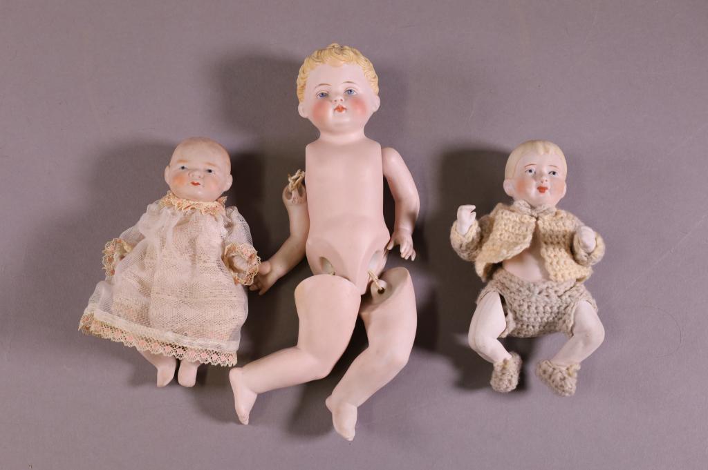 3 PORCELAIN BABY DOLLS (1 of 2)