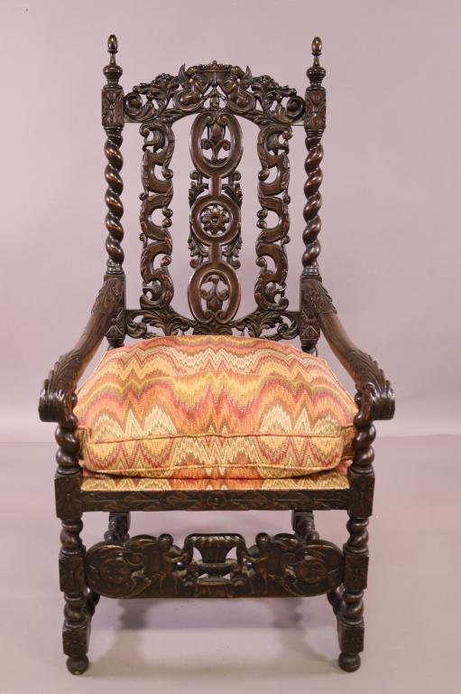 1920'S CARVED BARLEY TWIST HALL CHAIR: FIGURAL CARVED TOP AND BOTTOM. NEWLY REUPHOLSTERED SEAT AND CUSHION. GOOD OVERALL CONDITION. 25" W x 26" D x 49" H. THIS ITEM EXCEEDS SIZE LIMITATIONS FOR IN HOUSE SHIPPING.