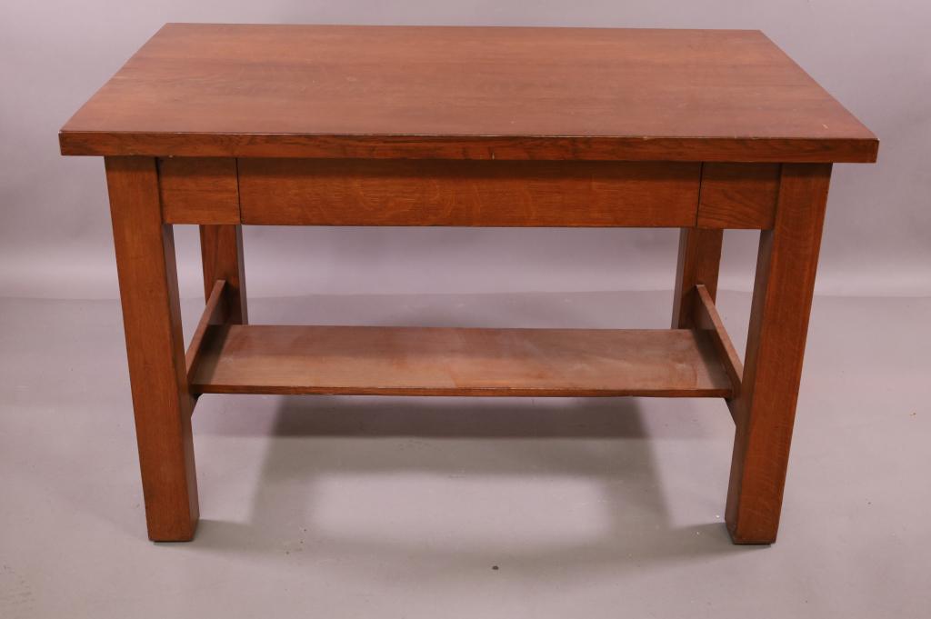 ARTS & CRAFTS OAK DESK: SINGLE DRAWER. MISSION OAK. MINOR FINISH WEAR. 48" W x 30" D x 30" H. THIS ITEM EXCEEDS SIZE LIMITATIONS FOR IN HOUSE SHIPPING.