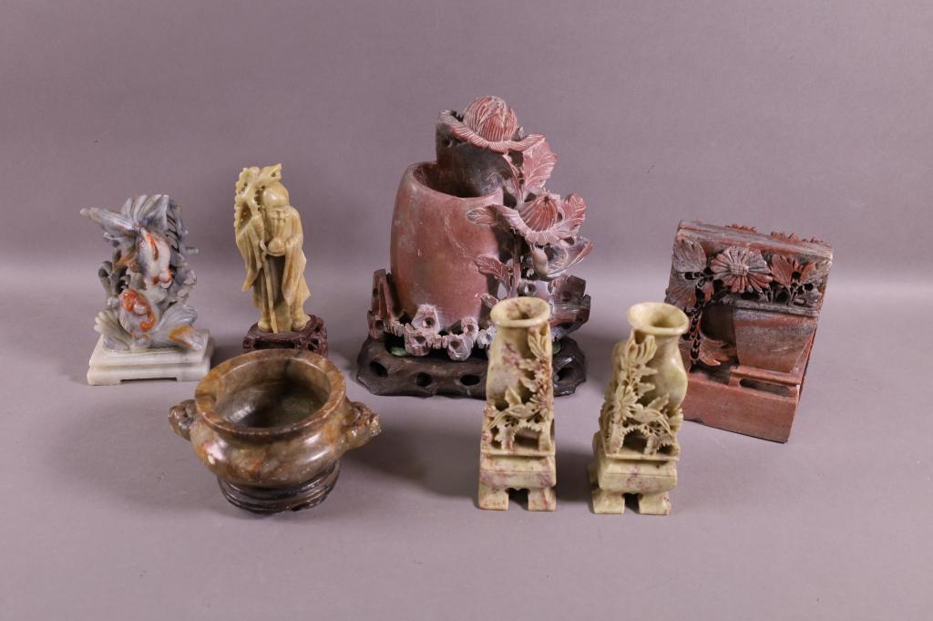 7 PIECES OF SOAPSTONE: PAIR OF BOOKENDS, FIGURE, BOWL, PAIR OF SMALL VASES, & FISH SCULPTURE. MINOR CHIPS TO SOAPSTONE. 3" - 7" H.