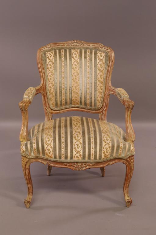FRENCH STYLE ARMCHAIR: FLORAL UPHOLSTERED ARMCHAIR. COUNTRY FRENCH STYLE. GOOD CONDITION. 25" W x 25" D x 36" H. THIS ITEM EXCEEDS SIZE LIMITATIONS FOR IN HOUSE SHIPPING.