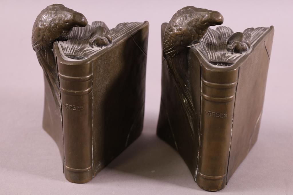 PAIR OF METAL PARROT ON BOOKS BOOKENDS: METAL PARROT BOOKENDS. GOOD CONDITION. 6" H.