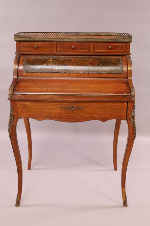1930'S FRENCH LADY'S WRITING DESK: ROLL/FLIP TOP FRENCH WRITING DESK. APPLIED ORMOLU. MINOR FINISH WEAR. 30"W x 20" D x 43"H. THIS ITEM EXCEEDS SIZE LIMITATIONS FOR IN HOUSE SHIPPING.