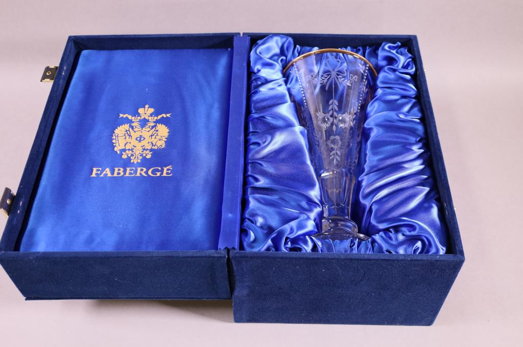 FABERGE CRYSTAL VASE: IN ORIGINAL BOX. ETCHED VASE WITH GOLD RIM. GOOD CONDITION. 9" H.