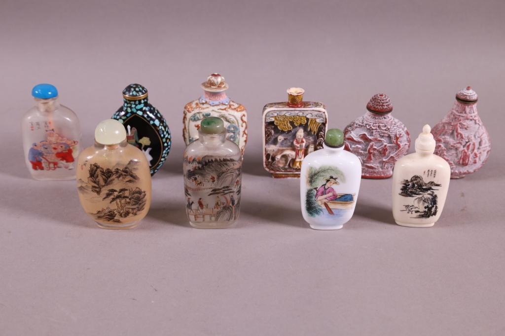 11 SNUFF BOTTLES: 3 REVERSE PAINTED, 1 BONE, 1 PEKING GLASS, & MORE! ONE MISSING STOPPER. SOME ARE SIGNED.