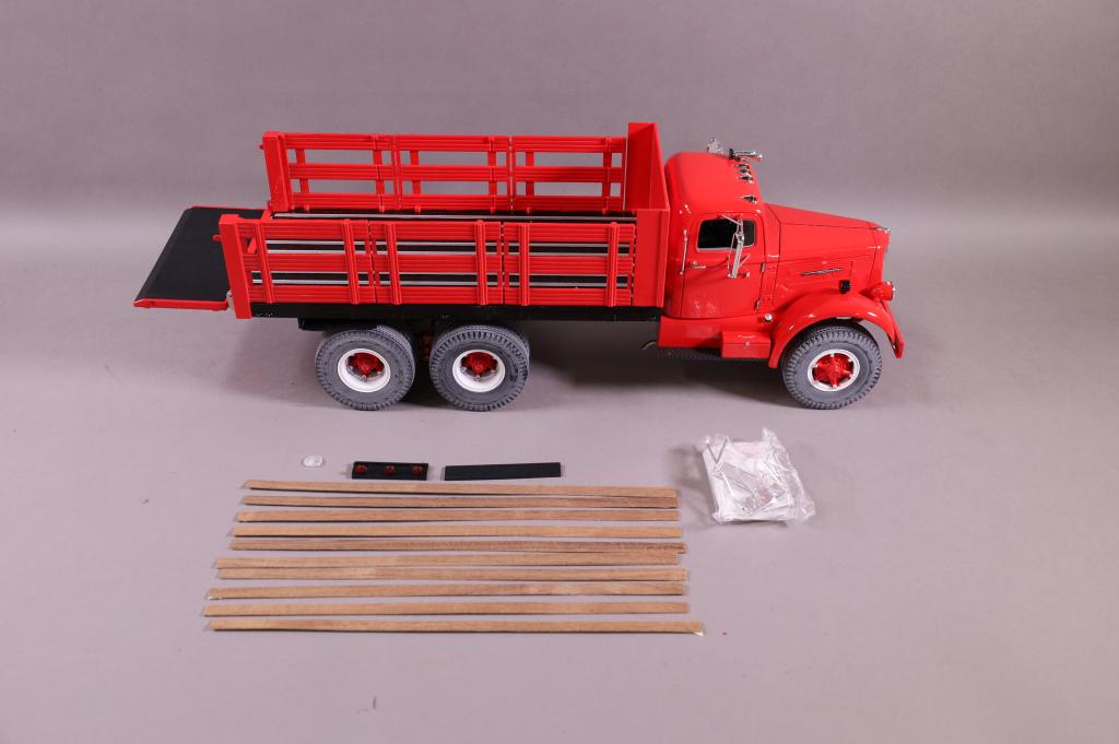 FUMBY DIE CAST WHITE DUMP TRUCK: HAS ORIGINAL BOX. HAS MIRRORS & STRIPS FOR BED IN ORIGINAL PACKAGING. 19" L