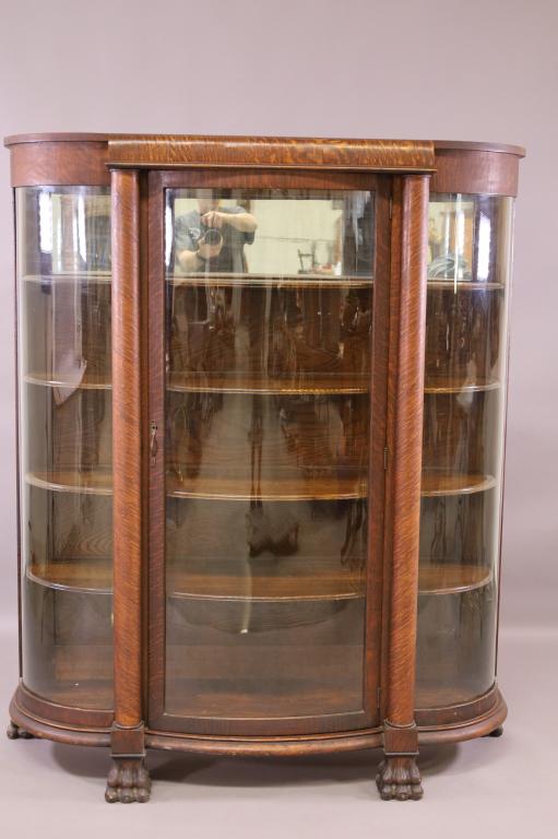 1900'S AM. OAK TRIPLE BOW FRONT CHINA CABINET (1 of 4)