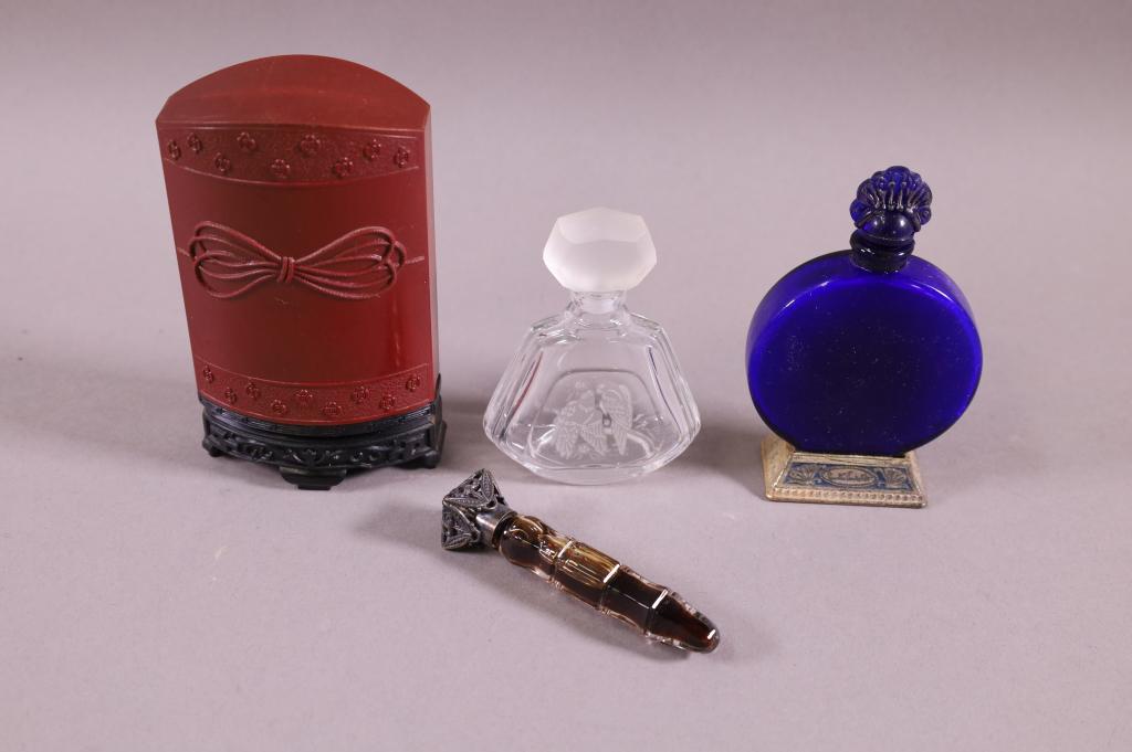 4 VINTAGE PERFUME BOTTLES (1 of 4)