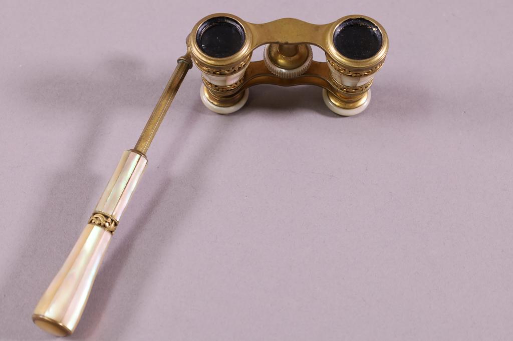 PAIR OF ANTIQUE FRENCH OPERA GLASSES: MOTHER OF PEARL INLAY WITH HANDLE. 8" LONG WITH THE HANDLE.