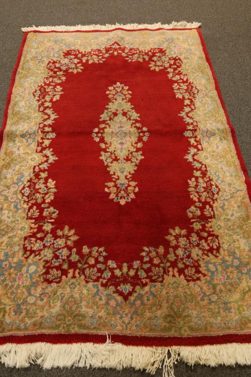 HANDMADE PERSIAN WOOL RUG: HANDMADE PERSIAN SCULPTURE WOOL, APPROX. 4' X 6'. KIRMAN. HAS WEAR, NEEDS CLEANING.