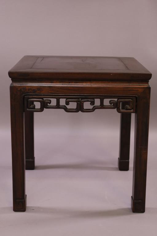 CHINESE HARDWOOD LAMP TABLE: CHINESE HARDWOOD SIDE TABLE. FINISH IN GOOD CONDITION. SOME BREAKS TO CARVING. 19" x 19" x 20" H. THIS ITEM EXCEEDS SIZE LIMITATIONS FOR IN HOUSE SHIPPING.