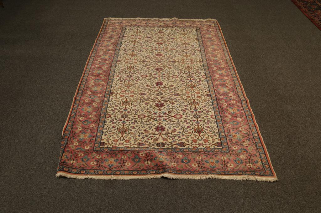 HANDMADE PERSIAN RUG: FLORAL DESIGN, NEEDS CLEANING. APPROX. 7' 4" X 5'
