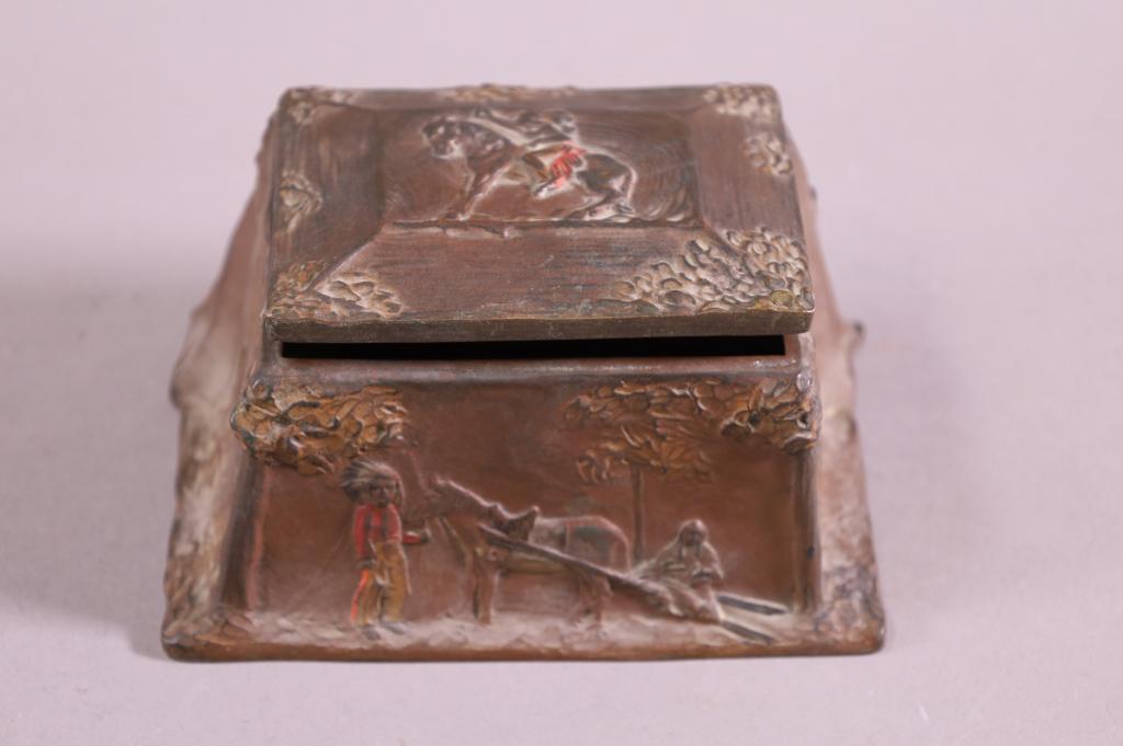 AUSTRIAN BRONZE NATIVE AMERICAN DRESSER BOX: SIGNED MADE IN AUSTRIA. NATIVE AMERICAN MOTIF. HINGED LID. MINOR PAINT WEAR, LID HAS SLIGHT WARP. 5" W x 6" D x 4" H.