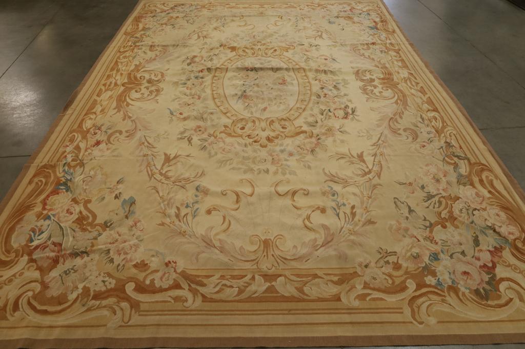 APPROX 12' x 8' 6" FRENCH AUBUSSON RUG: ROSE FLORAL PATTERN. NEEDS CLEANED. THIS ITEM EXCEEDS SIZE LIMITATIONS FOR IN HOUSE SHIPPING.
