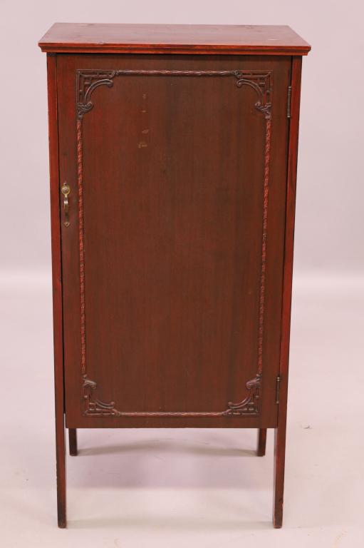 1900'S MAHOGANY MUSIC CABINET: SINGLE DOOR, 8 DRAWER, MAHOGANY RECORD CABINET, SHEET MUSIC CABINET. MINOR WEAR TO FINISH. 19 1/2" W x 15" D x 39" H. THIS ITEM EXCEEDS SIZE LIMITATIONS FOR IN HOUSE SHIPPING.