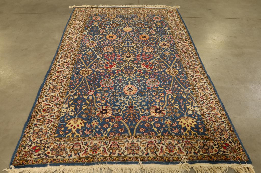 APPROX 5' x 8' HANDMADE WOOL RUG (1 of 4)