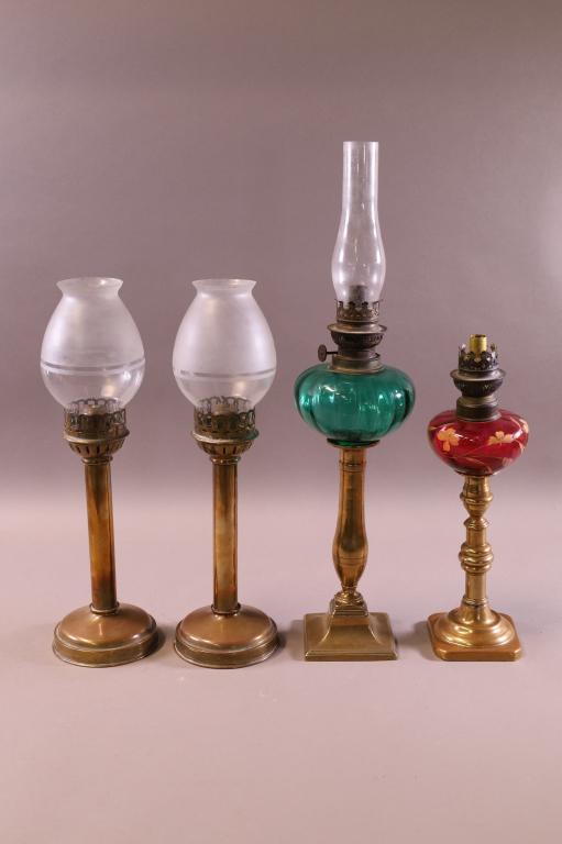 4 19TH CENTURY OIL LAMPS: PAIR OF BRASS OIL LAMPS WITH GLASS SHADES, 15" H & BRASS AND GREEN GLASS, 21" H. BRASS AND CRANBERRY GLASS, 13" H. NO CHIMNEY.