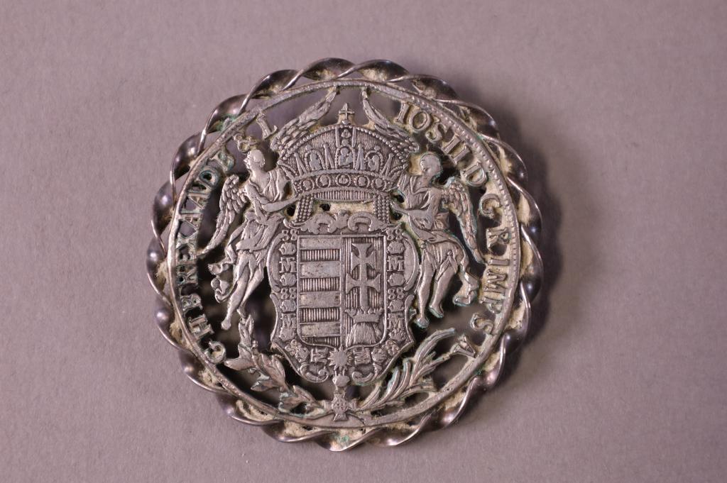 HUNGARIAN HALF THALER: HUNGARIAN .833 SILVER COIN MADE INTO PIN.