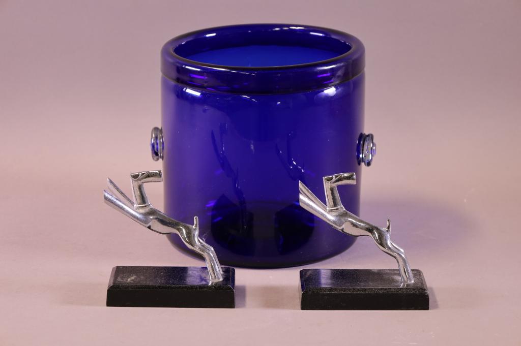 2 MID CENTURY MODERN TABLE ITEMS: BLUE COBALT GLASS ICE BUCKET 8" TALL 7 1/2" DIAMETER & CHROME DOG BOOKENDS.