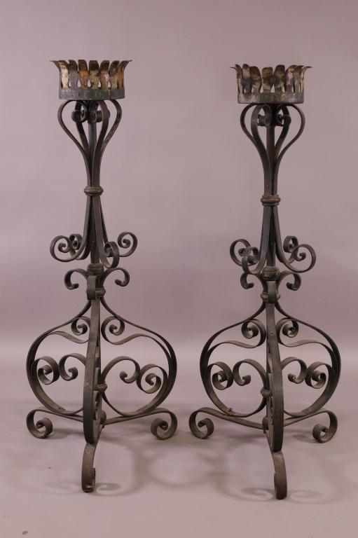 PAIR OF ANTIQUE SPANISH IRON PLANTERS: TALL SPANISH IRON PLANTERS. HAND WROUGHT. 50" H. THIS ITEM EXCEEDS SIZE LIMITATIONS FOR IN HOUSE SHIPPING.