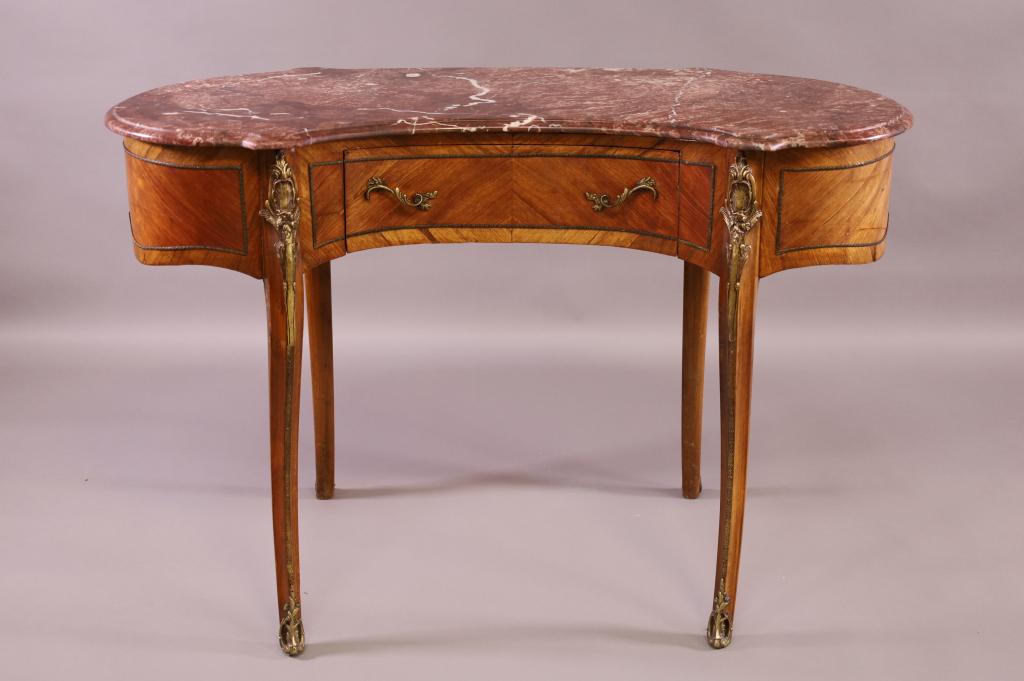 FRENCH MARBLE TOP KIDNEY SHAPED DESK: BRONZE MOUNTED SINGLE DRAWER MARBLE TOP FRENCH DESK. GOOD CODNITION. 49" W x 25" D x 33" H. THIS ITEM EXCEEDS SIZE LIMITATIONS FOR IN HOUSE SHIPPING.