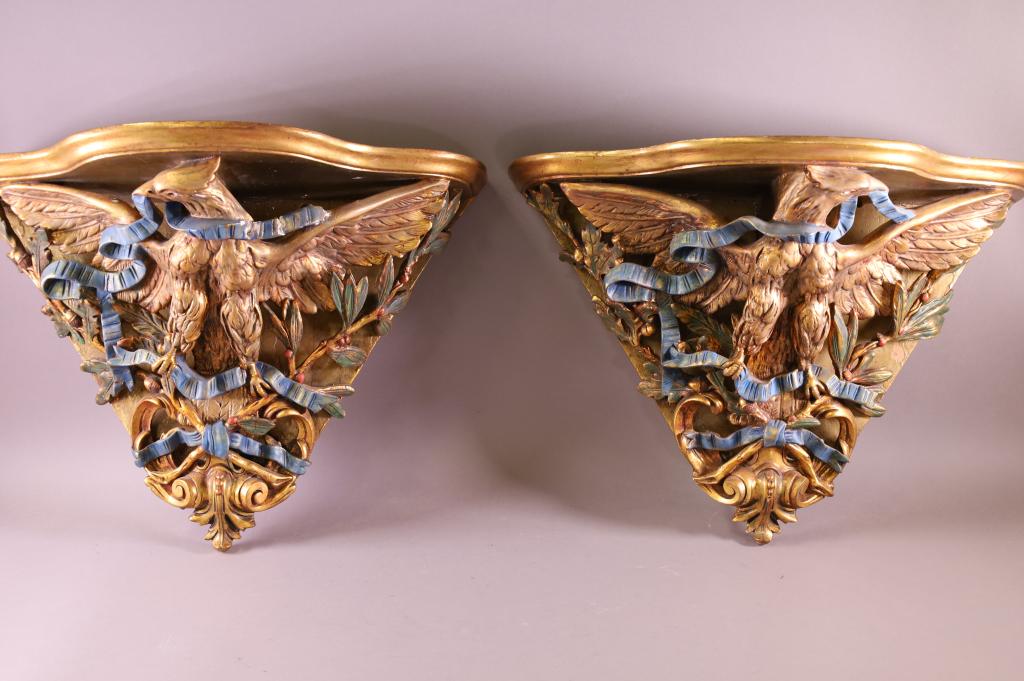 PAIR OF LARGE EAGLE WALL SHELVES: LARGE COMPOSITION WALL SHELVES, EAGLE FORM. HAND PAINTED. REPAIR TO ONE, MINOR PAINT LOSS TO BOTH. 22" W x 16" H. THIS ITEM EXCEEDS SIZE LIMITATIONS FOR IN HOUSE SHIPPING.