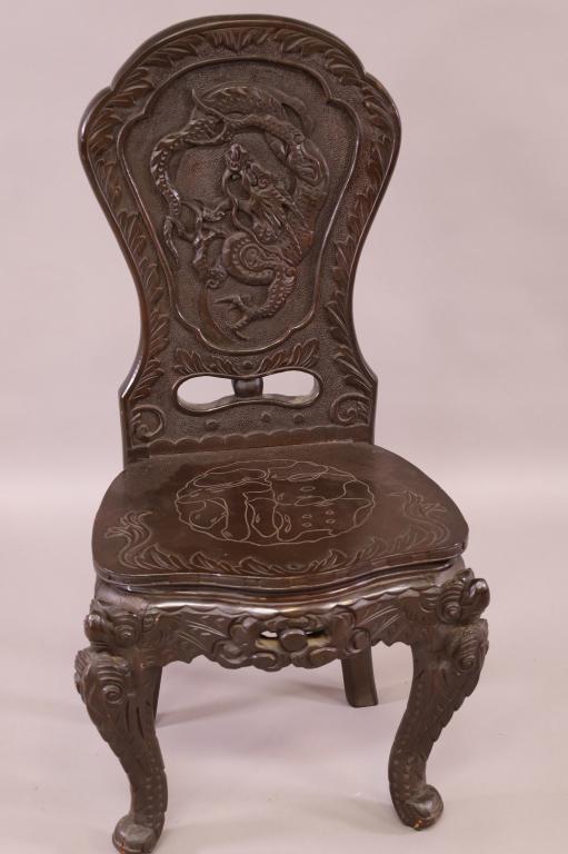 ANTIQUE CARVED JAPANESE DESK CHAIR: DRAGON CARVED BACK, GOOD CONDITION. 20" W x 17" D x 39" H. THIS ITEM EXCEEDS SIZE LIMITATIONS FOR IN HOUSE SHIPPING.