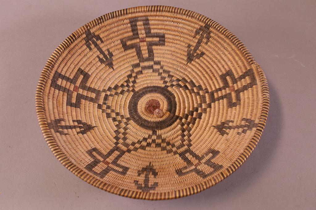 ANTIQUE NATIVE AMERICAN BASKET: CROSS AND ARROW PATTERN, HAND WOVEN NATIVE AMERICAN BASKET. GOOD CONDITION. 11" DIAM x 2" H