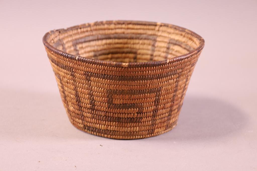 ANTIQUE NATIVE AMERICAN BASKET: MINOR DAMAGE TO THE RIM, 6 1/2" DIAM x 5 1/2" H.