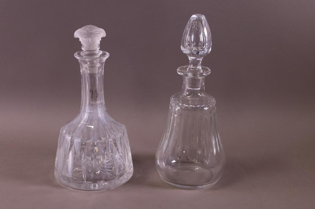 2 DECANTERS (BACCARAT & VERSACE): BACCARAT & VERSACE. GOOD CONDITION. 10 1/2" H / 11 1/2" H