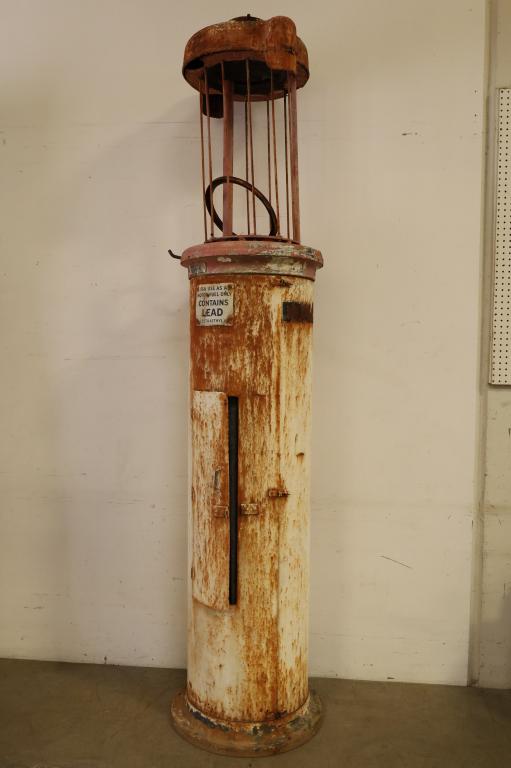 UNKNOWN TEN GALLON VISIBLE GAS PUMP: IN AS FOUND ORIGINAL CONDITION, CYLINDER IS GOOD, HAS NO PUMP OR HANDLE, SKINS ARE STRAIGHT BUT RUSTY, 102"T. THIS ITEM EXCEEDS SIZE LIMITATIONS FOR IN HOUSE SHIPPING