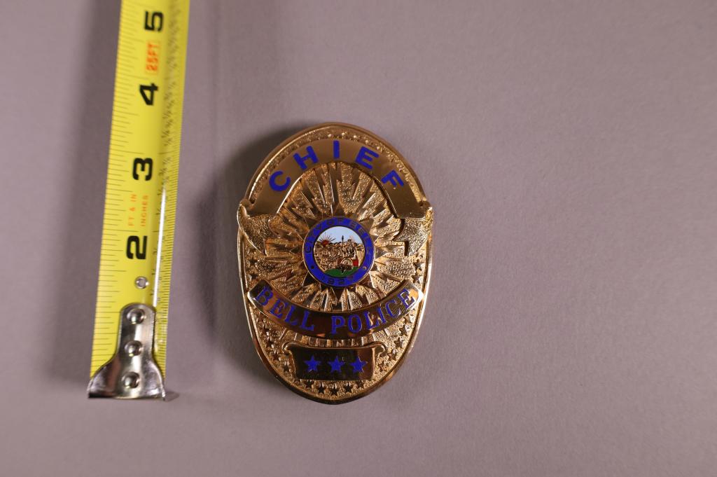 OBSOLETE BELL POLICE CHIEF BADGE: CITY OF BELL. MARKED APRIL ON REVERSE.