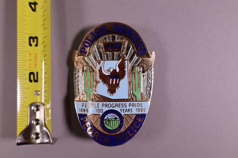 OBSOLETE PEORIA POLICE BADGE: PEORIA ARIZONA POLICE OFFICER BADGE, BADGE #2845. MARKED BNB PHOENIX AZ ON REVERSE.