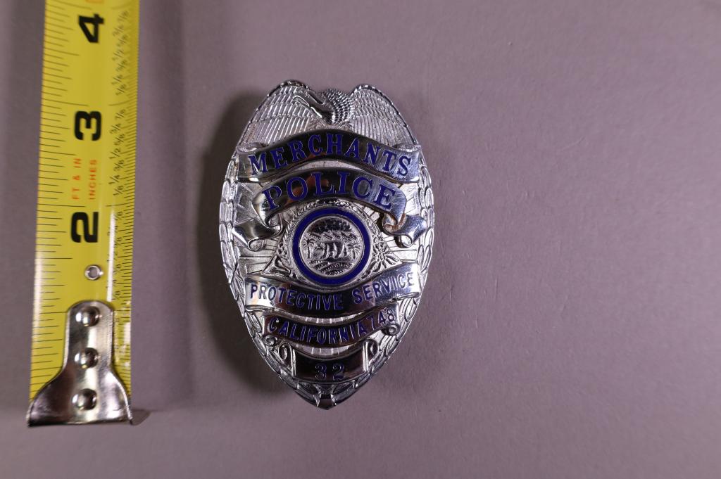 OBSOLETE MERCHANTS POLICE BADGE: CALIFORNIA PROTECTIVE POLICE BADGE. BADGE #32.
