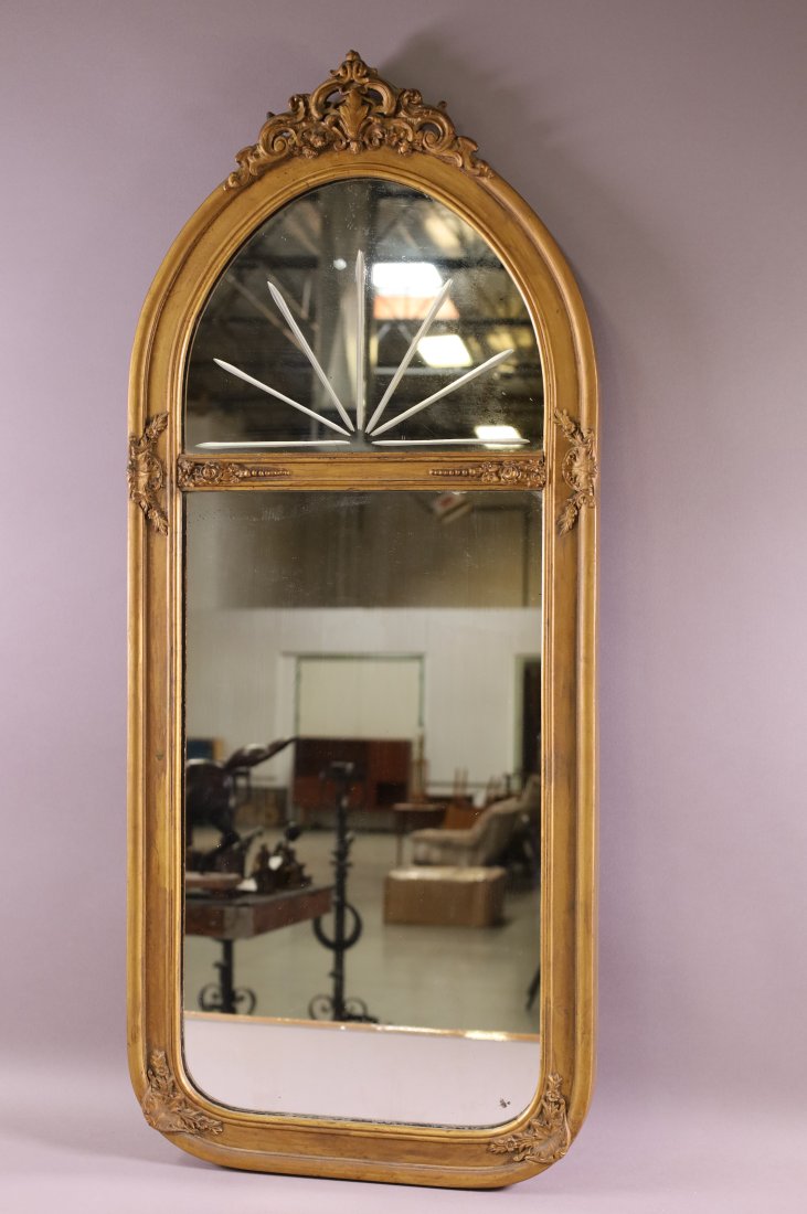 GOLD GILT ETCHED WALL MIRROR: CARVED GOLD GILT WALL MITTOR ETCHED TOP. GOOD CONDITION. 34" x 15"