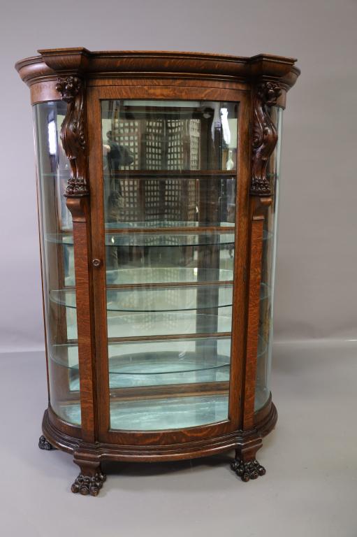 1900'S AM. OAK TRIPLE BOW FRONT CHINA CABINET (1 of 3)