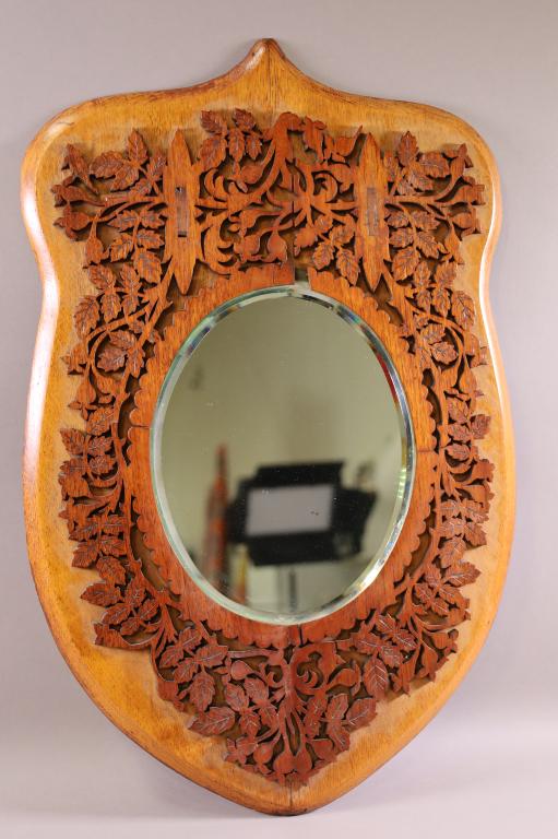 ANTIQUE CARVED WALL MIRROR: LEAF AND ACORN DESIGN, BEVELED WALL MIRROR. MISSING SOME CARVING. 17" x 25"