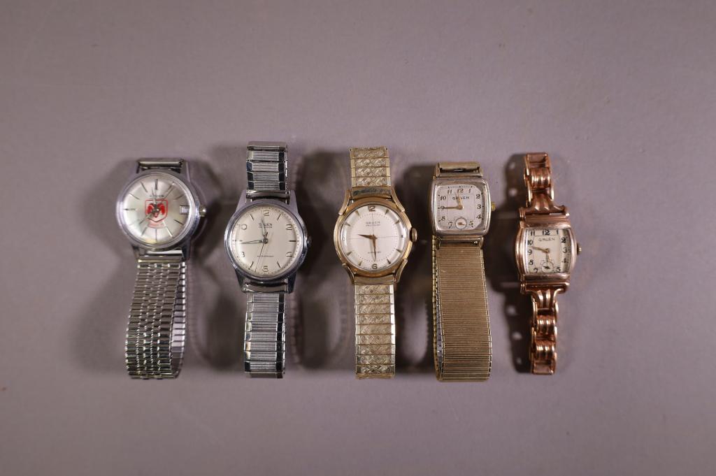 COLLECTION OF 5 VINTAGE MENS WRIST WATCHES: GRUEN WRISTWATCHES. ALL WATCHES ARE SOLD AS IS WE DO NOT GUARANTEE WORKING ORDER.