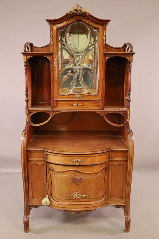 1900'S FRENCH ART NOUVEAU ETAGERE: LEADED DOOR UPPER, LOWER DOORS AND DRAWERS. BRONZE ORMOLU. BIRDS EYE MAPLE INTERIOR. WITH KEY. GOOD CONDITION. 37" W x 20" D x 75" H. THIS ITEM EXCEEDS SIZE LIMITATIONS FOR IN HOUSE SHIPPING.