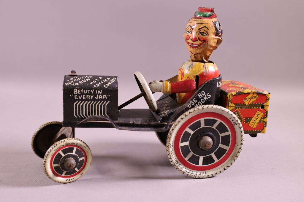 MARX TIN LITHO WINDUP JOY RIDER (1 of 4)