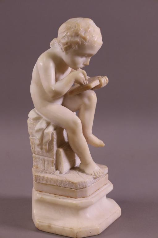 MARBLE STATUE OF BOY WRITING: BOY WRITING. UNSIGNED, UNMARKED. HAS BEEN REPAIRED. 12" H