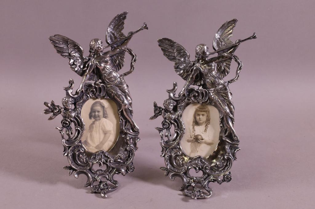 PAIR OF SILVERPLATED CHERUB PICTURE FRAMES (1 of 3)