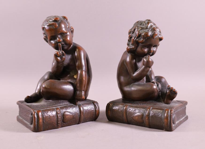 PAIR OF BRONZE CLAD BOOKENDS (1 of 2)